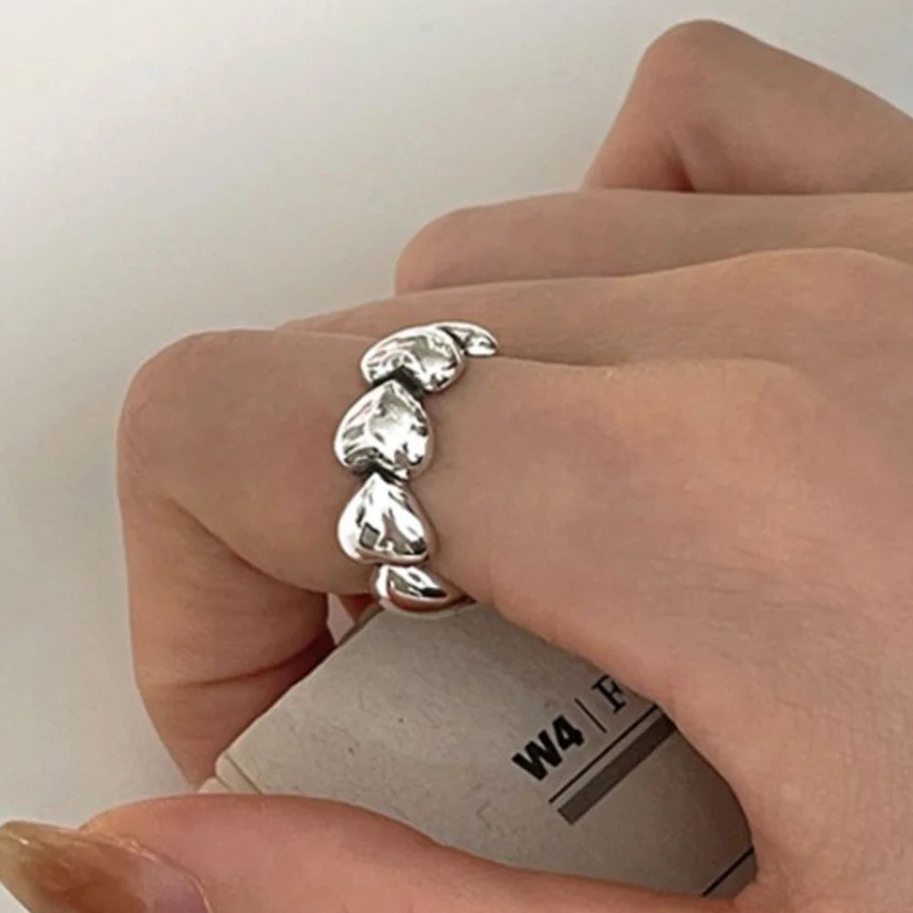 Anillo minimalista abierto con forma de corazón en plata de ley 925: elegante banda ajustable para mujer