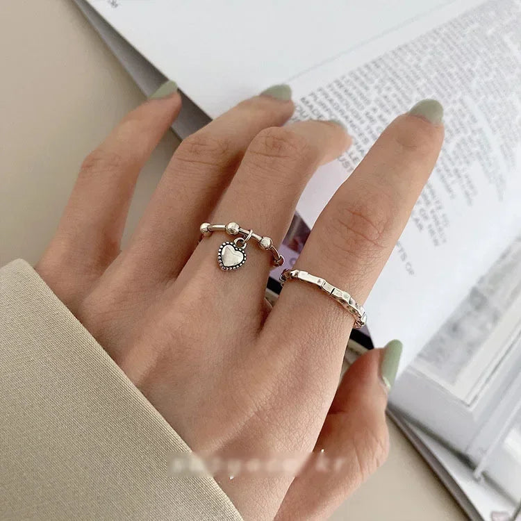 Anillo de corazón de plata de ley 925: alianza minimalista ajustable para mujer
