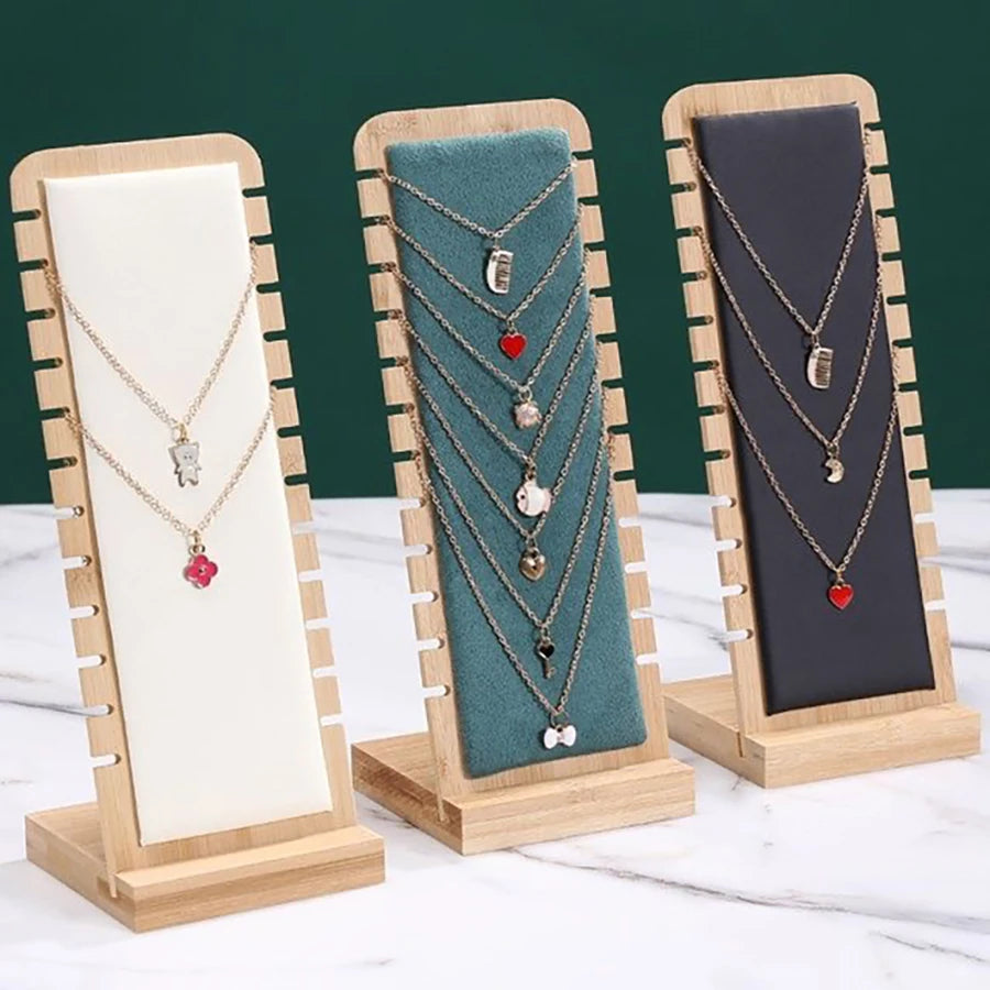 Expositor vertical de joyas de bambú: elegante organizador de cuero y madera para collares, anillos y pendientes