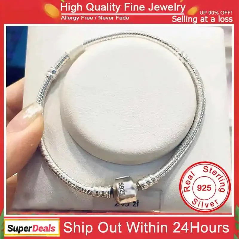 Pulsera con dijes en plata de ley 925: joyería elegante y atemporal para la muñeca