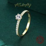 Anillo de compromiso de boda con circonitas bañadas en oro y plata de ley 925 de Ailmay: elegancia atemporal