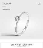 Anillo de dedo con circonita cúbica transparente y redondo de plata esterlina 925 de Modian: alianza de boda clásica para mujer, regalo de joyería fina