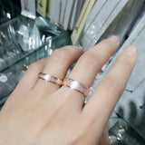 Anillos minimalistas de acero inoxidable esmerilado para parejas: elegantes alianzas de boda unisex