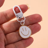 Trendy Smile Face Keychain for Women – Cute Alloy Bag Charm & Key Ring