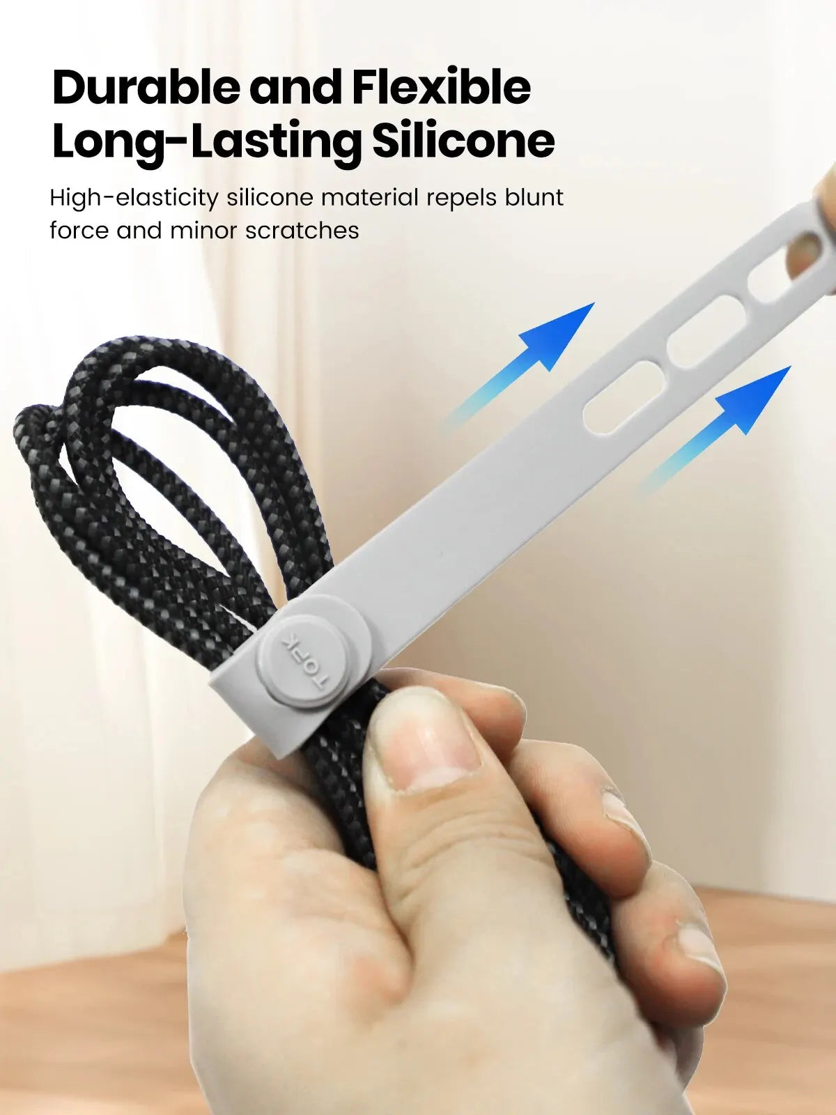 Silicone cable ties – grey tie on braided cable, tall crop