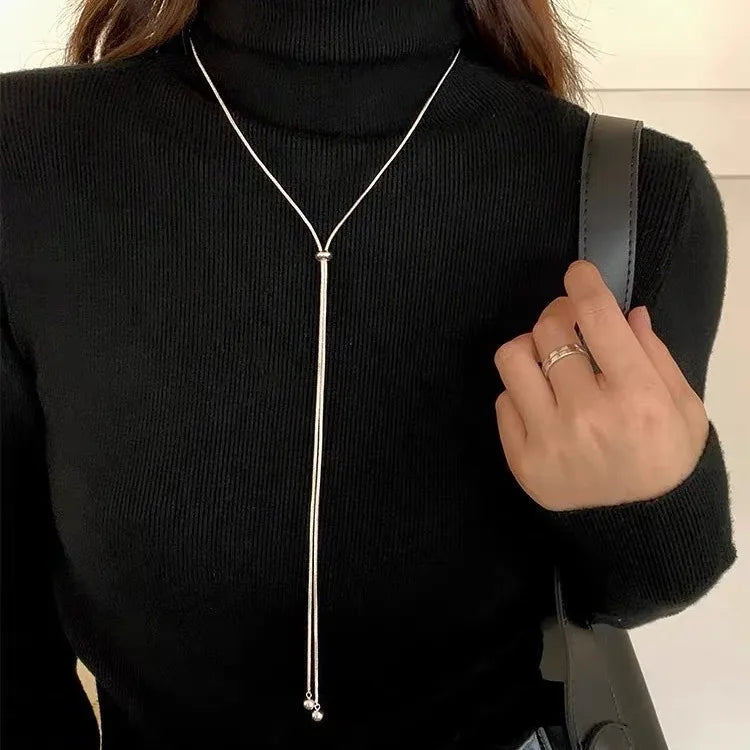 Elegante collar largo con borlas: cadena de acero de titanio para suéter para mujer