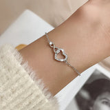 Pulsera con dije de corazón doble en plata de ley 925: joyería elegante y romántica para mujeres