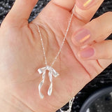 Elegant Bow Pendant Necklace – Silver Clavicle Chain for Women