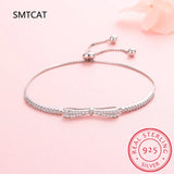 Elegante pulsera de plata de ley 925 con dije de circonita y lazo: belleza atemporal para cualquier ocasión