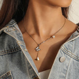 Collar de mariposa vintage multicapa: elegante gargantilla de acero inoxidable para mujer