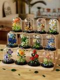 Juego de bloques de construcción con rosas y suculentas en macetas: decoración del hogar con flores eternas