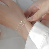 Pulsera con dije de corazón doble en plata de ley 925: joyería elegante y romántica para mujeres