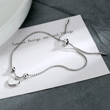 Pulsera con dije de corazón doble en plata de ley 925: joyería elegante y romántica para mujeres