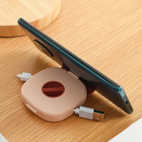 Carrete de almacenamiento de cables compacto: organizador giratorio para cables USB, de auriculares y de carga