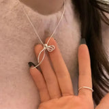 Elegant Bow Pendant Necklace – Silver Clavicle Chain for Women