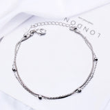 Pulsera con dije de corazón doble en plata de ley 925: joyería elegante y romántica para mujeres