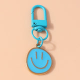 Trendy Smile Face Keychain for Women – Cute Alloy Bag Charm & Key Ring