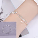 Pulsera con dije de corazón doble en plata de ley 925: joyería elegante y romántica para mujeres