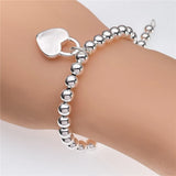 Pulsera con dijes de plata de ley 925: diseño geométrico clásico para ocasiones especiales, bodas y unisex