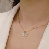 Elegante collar con colgante de mariposa: joyas de cristal brillante para mujer