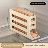 Caja de almacenamiento de huevos con ruedas automáticas - Organizador de huevos para refrigerador de 4 capas con gran capacidad | Dispensador de huevos eficiente para almacenamiento en la cocina 