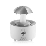 Humidificador con forma de paraguas giratorio y gotas de agua: niebla silenciosa, aromaterapia y luz nocturna colorida
