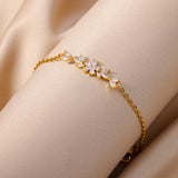 Pulsera de acero inoxidable con dijes de moda para mujer: diseño de plantas con cierre de pinza de langosta