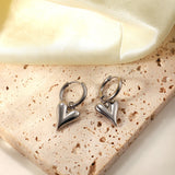 Pendientes de acero inoxidable con forma de corazón: joyas elegantes para mujer