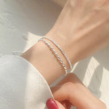 Pulsera con dije de corazón doble en plata de ley 925: joyería elegante y romántica para mujeres