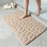 Alfombrilla de baño antideslizante 3D con relieve de adoquines y absorbente de secado rápido