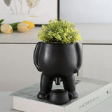 Funny Ceramic Peeing Planter with Artificial Plant for Desktop Decoration