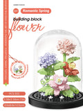 Juego de bloques de construcción con rosas y suculentas en macetas: decoración del hogar con flores eternas