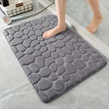 Alfombrilla de baño antideslizante 3D con relieve de adoquines y absorbente de secado rápido