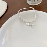 Pulsera con dije de corazón vintage en plata de ley 925: joyería elegante y atemporal para mujeres