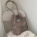Bolso de mano grande e informal elegante de estilo coreano, bolso de hombro con estampado de leopardo para mujer, bolso de lona, ​​nuevo bolso de compras, bolso de mano con estampado de estudiante, bolsa para mujer