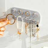 Estante de almacenamiento de joyas para montaje en pared: organizador de plástico duradero para anillos, collares y más