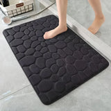 Alfombrilla de baño antideslizante 3D con relieve de adoquines y absorbente de secado rápido