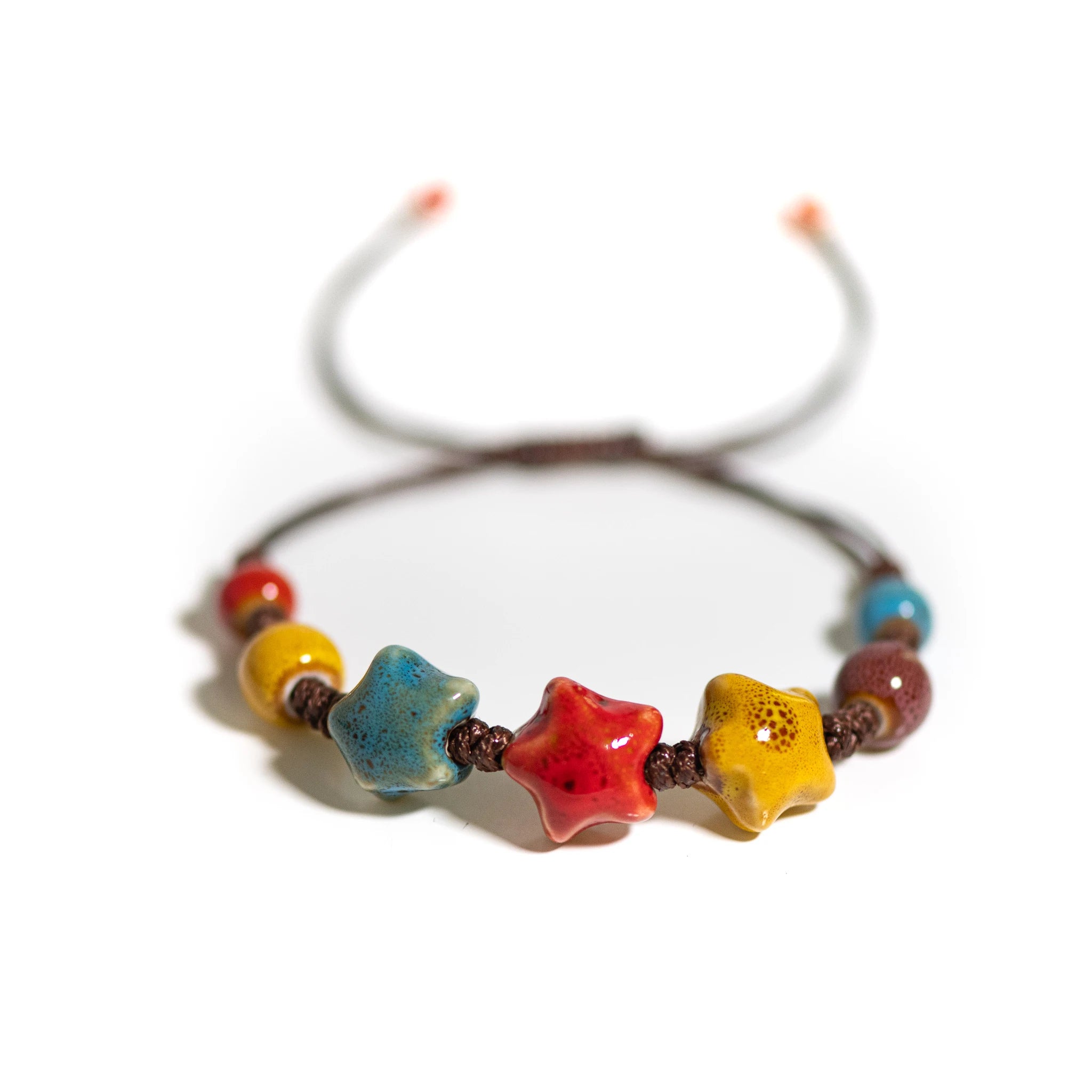 Pulsera de cerámica con forma de estrella hecha a mano para mujer: joyería con cordón encerado ajustable