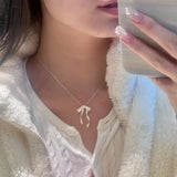 Elegant Bow Pendant Necklace – Silver Clavicle Chain for Women