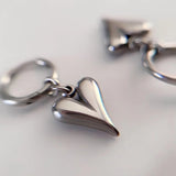 Pendientes de acero inoxidable con forma de corazón: joyas elegantes para mujer