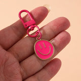 Trendy Smile Face Keychain for Women – Cute Alloy Bag Charm & Key Ring