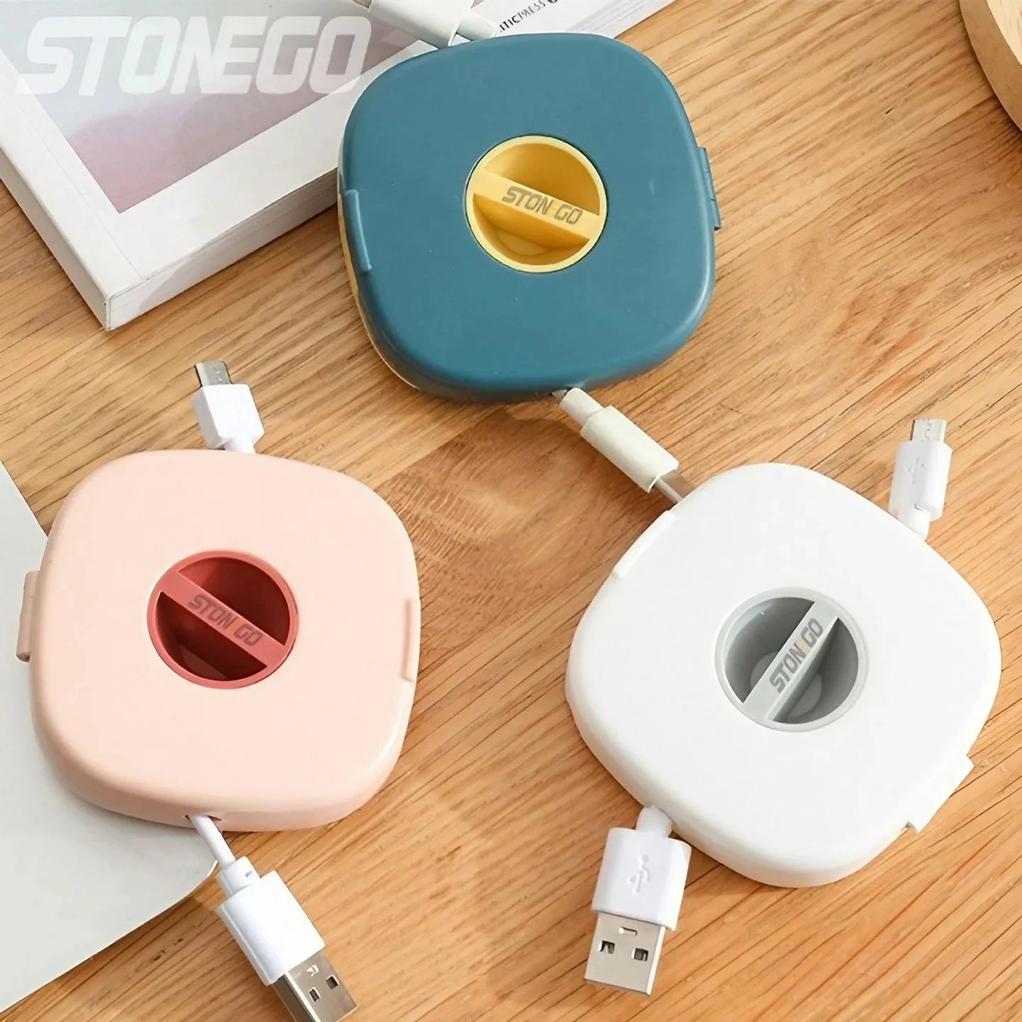 Carrete de almacenamiento de cables compacto: organizador giratorio para cables USB, de auriculares y de carga