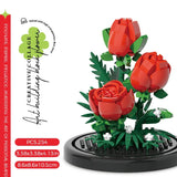 Juego de bloques de construcción con rosas y suculentas en macetas: decoración del hogar con flores eternas