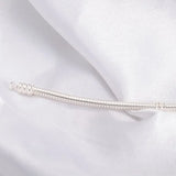 Pulsera de plata bañada en oro con dijes de moda: joyería elegante para mujeres