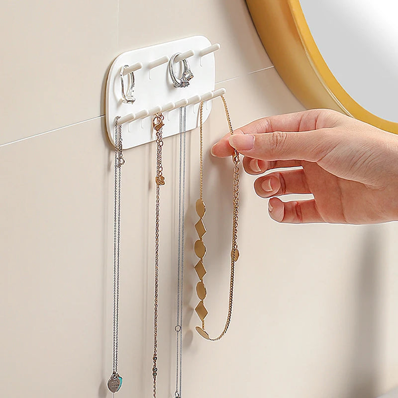 Estante de almacenamiento de joyas para montaje en pared: organizador de plástico duradero para anillos, collares y más