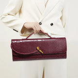 Women’s Serpentine PU Leather Baguette Bag – Fashion Shoulder Purse with Interior Pockets