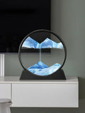 Reloj de arena redondo de cristal con forma de paisaje de las profundidades marinas: imagen artística de arena en movimiento en 3D