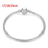 Pulsera de plata bañada en oro con dijes de moda: joyería elegante para mujeres