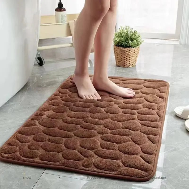 Alfombrilla de baño antideslizante 3D con relieve de adoquines y absorbente de secado rápido