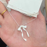 Elegant Bow Pendant Necklace – Silver Clavicle Chain for Women